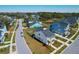 Aerial view of a neighborhood featuring colorful homes, landscaping, and sidewalks at 2461 Lieutenant Dozier Dr, Johns Island, SC 29455