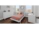 Cozy bedroom with a bed, dresser, nightstand, and charming decor at 2461 Lieutenant Dozier Dr, Johns Island, SC 29455