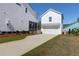 Home exterior featuring driveway, garage, and siding at 2461 Lieutenant Dozier Dr, Johns Island, SC 29455