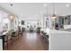 Open concept living space with dining area, modern kitchen, and a cozy living room at 2461 Lieutenant Dozier Dr, Johns Island, SC 29455