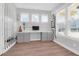 Bright office featuring custom built-ins, several windows, and ample storage space at 2461 Lieutenant Dozier Dr, Johns Island, SC 29455