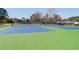 Community tennis courts with well maintained nets and green and blue surfaces at 2461 Lieutenant Dozier Dr, Johns Island, SC 29455
