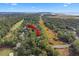 A lush, green community featuring a golf course and wetland views from the air on a sunny day at 2515 Cat Tail Pond Rd, Seabrook Island, SC 29455