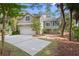 Well-maintained home exterior with a white garage door and an attractive facade at 2515 Cat Tail Pond Rd, Seabrook Island, SC 29455