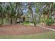 Charming single-Gathering home featuring a well-manicured lawn and beautiful trees at 2515 Cat Tail Pond Rd, Seabrook Island, SC 29455