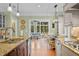 Open-concept kitchen and breakfast nook overlook backyard at 2515 Cat Tail Pond Rd, Seabrook Island, SC 29455
