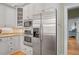 Modern kitchen showcases stainless steel appliances, including a refrigerator and microwave, with wood flooring at 2515 Cat Tail Pond Rd, Seabrook Island, SC 29455
