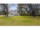 Spacious front yard with mature trees, providing shade for this quaint home at 2604 Highway 78, Dorchester, SC 29437