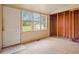 A room featuring a view of the backyard through the windows and doorway to the outside at 2604 Highway 78, Dorchester, SC 29437