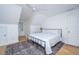 Bedroom features a ceiling fan and natural light with a black metal bed frame at 2621 Ringsted Ln, Mount Pleasant, SC 29466