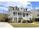 Inviting two-story home with a large porch and lovely curb appeal at 2621 Ringsted Ln, Mount Pleasant, SC 29466