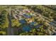 A high aerial view of tennis courts and pool area amenities in a lushly vegetated planned community at 2901 Eddy Dr, Mount Pleasant, SC 29466