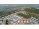 Aerial view of a residential area with homes, trees, and a river with a bridge in the background at 2901 Eddy Dr, Mount Pleasant, SC 29466