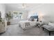 Comfortable bedroom featuring a ceiling fan, a large window, and neutral decor at 2901 Eddy Dr, Mount Pleasant, SC 29466