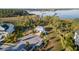 Aerial view of community clubhouse and playground surrounded by lush green lawns and palm trees at 2901 Eddy Dr, Mount Pleasant, SC 29466