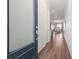 Bright entryway with beautiful hardwood floors and white trim, leading to an open floor plan at 2901 Eddy Dr, Mount Pleasant, SC 29466