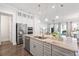 Open-concept kitchen with stainless steel appliances, large island, and plenty of natural light at 2901 Eddy Dr, Mount Pleasant, SC 29466