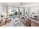 Bright living room featuring a comfortable sofa, dining area, and ample natural light at 2901 Eddy Dr, Mount Pleasant, SC 29466