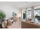 Bright and inviting living room with large windows, comfortable seating, and stylish decor at 2901 Eddy Dr, Mount Pleasant, SC 29466