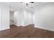 Open living space with dark hardwood floors, recessed lighting, and white trim at 2901 Eddy Dr, Mount Pleasant, SC 29466