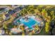 Aerial view of a resort-style swimming pool featuring ample lounge seating and lush landscaping at 2901 Eddy Dr, Mount Pleasant, SC 29466