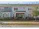 Exterior view of multi-Gathering residential building with multiple screened in porches and manicured landscaping at 2901 Eddy Dr, Mount Pleasant, SC 29466
