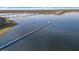 Beautiful aerial showcases a long pier with gazebo along picturesque waterway adjacent to community at 2901 Eddy Dr, Mount Pleasant, SC 29466