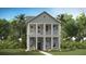 Charming two-story home with a columned porch and manicured lawn at 297 Citrus Dr, Summerville, SC 29486