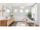 Bright office with a large window, wooden desk, and stylish chandelier at 297 Citrus Dr, Summerville, SC 29486