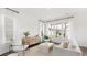 Airy living room with light furnishings, bright windows, and minimalist decor at 297 Citrus Dr, Summerville, SC 29486
