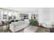 Bright living room with modern furnishings and a view into the kitchen at 297 Citrus Dr, Summerville, SC 29486