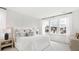 Bright main bedroom with white bedding, large windows, and modern design at 297 Citrus Dr, Summerville, SC 29486