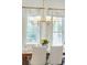 A close up view of the dining room, featuring elegant window treatments and decor at 3 Cross Ln, Isle of Palms, SC 29451