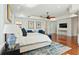 Luxurious main bedroom suite featuring hardwood floors, recessed lighting, and comfortable sitting area at 3 Cross Ln, Isle of Palms, SC 29451