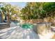 A clear, inviting pool is surrounded by a spacious patio, perfect for lounging and enjoying the outdoors at 3 Cross Ln, Isle of Palms, SC 29451