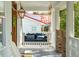 Inviting porch with a cozy swing and comfortable cushions, perfect for relaxing outdoors at 3 Cross Ln, Isle of Palms, SC 29451