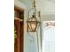 Close-up of an elegant porch lantern, adding a touch of vintage charm to the outdoor space at 3 Cross Ln, Isle of Palms, SC 29451