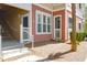 Apartment building entrance with stairs, stone landscaping and attractive exterior at 300 Bucksley Ln # 104, Charleston, SC 29492