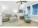 Bright bonus room features ample seating, hardwood floors, and a beautiful view from the windows at 3034 Bell Cv Aly, Johns Island, SC 29455