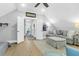 Bonus room featuring a large sofa, chairs, ottoman, and lots of space at 3034 Bell Cv Aly, Johns Island, SC 29455