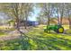 Visit the community farm featuring a vintage tractor, green grass, and an open-air building for gatherings at 3034 Bell Cv Aly, Johns Island, SC 29455