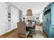 Charming dining room with natural light and stylish chandelier at 3034 Bell Cv Aly, Johns Island, SC 29455