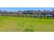 Lush fenced pasture with shelters providing a secure and comfortable environment for animals at 3034 Bell Cv Aly, Johns Island, SC 29455