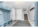 Inviting foyer featuring a charming mudroom and a staircase at 3034 Bell Cv Aly, Johns Island, SC 29455