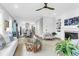 Open concept living room and dining area with modern decor and lots of natural light at 3034 Bell Cv Aly, Johns Island, SC 29455