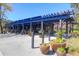 Dine outdoors at this community restaurant with a covered patio and lush landscaping at 3034 Bell Cv Aly, Johns Island, SC 29455