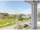 Scenic neighborhood and pond view from a window, showcasing the community's peaceful ambiance at 3034 Bell Cv Aly, Johns Island, SC 29455