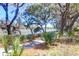 Peaceful walking path with views of the marsh and river surrounded by natural foliage at 3034 Bell Cv Aly, Johns Island, SC 29455