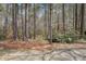 The property includes a lush treed backyard offering privacy and shade at 309 Edinburgh St, Summerville, SC 29483