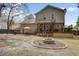 Backyard features deck, patio seating, and fire pit, perfect for gathering with friends and Gathering at 309 Edinburgh St, Summerville, SC 29483